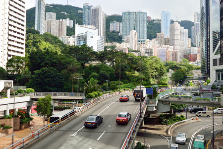 HONG KONG - JUNE 03, 2015: streets of Hong Kong. Hong Kong, is an autonomous territory on the southern coast of China at the Pearl River Estuary and the South China Seaのeditorial素材