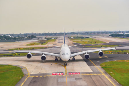 SINGAPORE - NOVEMBER 07, 2015: Airbus A380 taxiing at Changi Airport. Singapore Changi Airport, is the primary civilian airport for Singapore, and one of the largest transportation hubs in Southeast Asiaのeditorial素材