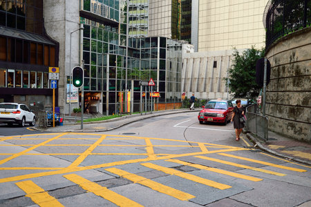HONG KONG - JUNE 03, 2015: streets of Hong Kong. Hong Kong, is an autonomous territory on the...