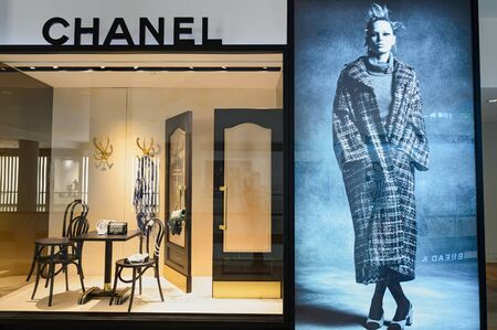SINGAPORE - NOVEMBER 08, 2015: shop window of Chanel store. Chanel S.A. is a high fashion house that specializes in haute couture and ready-to-wear clothes, luxury goods and fashion accessoriesのeditorial素材