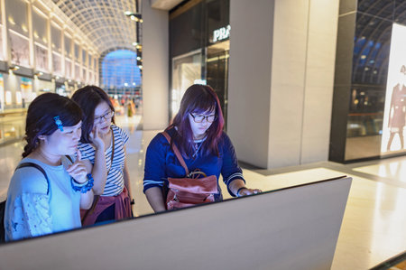SINGAPORE - NOVEMBER 08, 2015: people in The Shoppes at Marina Bay Sands. The Shoppes at Marina Bay...