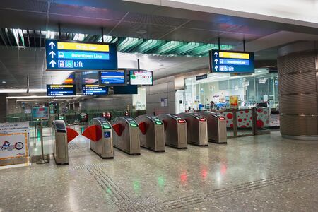 SINGAPORE - NOVEMBER 08, 2015: interior of MRT station. The Mass Rapid Transit, or MRT, is a rapid transit system forming the major component of the railway system in Singapore, spanning the entire city-stateのeditorial素材
