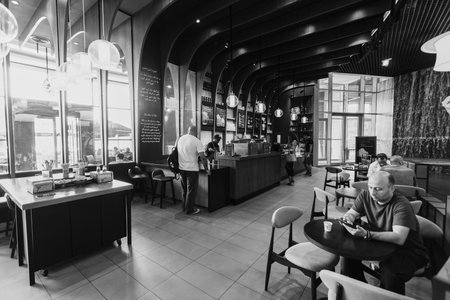 DUBAI - OCTOBER 15, 2014: interior of Starbucks Cafe at The Dubai Mall. Starbucks is the largest coffeehouse company in the world, with more then 23000 storesのeditorial素材