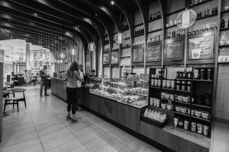 DUBAI - OCTOBER 15, 2014: interior of Starbucks Cafe at The Dubai Mall. Starbucks is the largest coffeehouse company in the world, with more then 23000 storesのeditorial素材