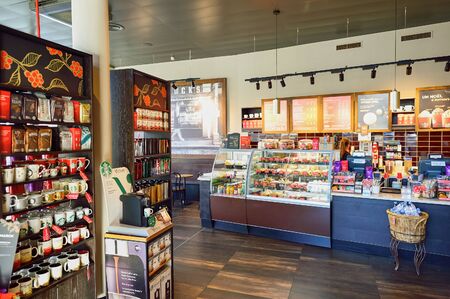 GENEVA, SWITZERLAND - NOVEMBER 18, 2015: interior of Starbucks Cafe. Starbucks Corporation is an...