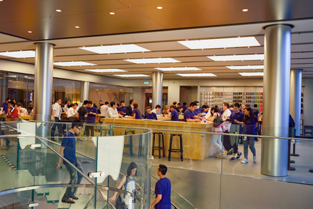 HONG KONG - MAY 5, 2015:  interior of Apple store. Apple Inc. is an American multinational technology company headquartered in Cupertino, California, that designs, develops, and sells consumer electronics, computer software, and online services.のeditorial素材
