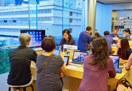 HONG KONG - MAY 5, 2015:  interior of Apple store. Apple Inc. is an American multinational technology company headquartered in Cupertino, California, that designs, develops, and sells consumer electronics, computer software, and online services.のeditorial素材