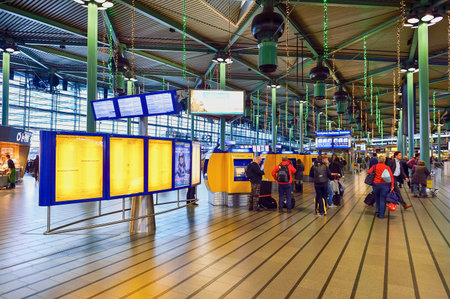 AMSTERDAM, NETHERLANDS - NOVEMBER 17, 2015: interior of Amsterdam Airport. Amsterdam Airport Schiphol is the main international airport of the Netherlands.のeditorial素材