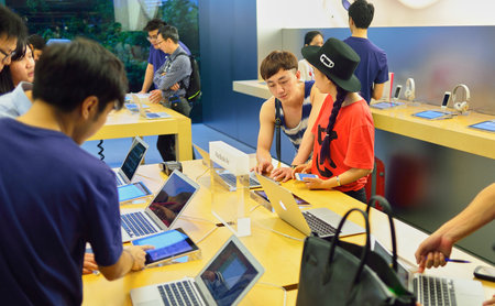 HONG KONG - MAY 5, 2015:  interior of Apple store. Apple Inc. is an American multinational...