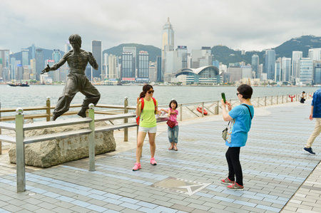 HONG KONG - MAY 06, 2015: Bruce Lee statue on The Avenue of Stars in Hong Kong. Avenue of Stars honours celebrities of the Hong Kong film industry.のeditorial素材