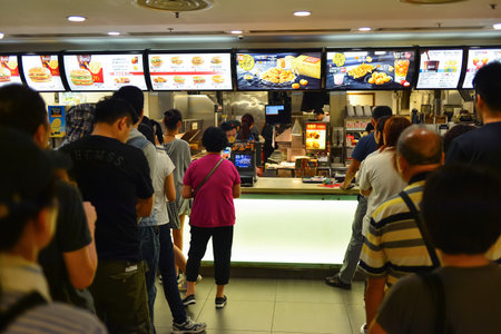 HONG KONG - APRIL 03, 2015: McDonald's restaurant interior. The McDonald's Corporation is the...