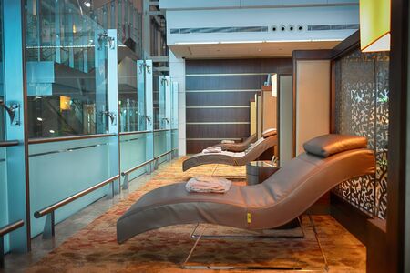 DUBAI, UAE - APRIL 18, 2014: airport interior. Dubai International Airport is a major international...