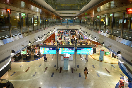 DUBAI, UAE - APRIL 18, 2014: airport interior. Dubai International Airport is a major international airport located in Dubai, and is the world's busiest airport by international passenger traffic. It is a major airline hub in the Middle East, and is the mのeditorial素材