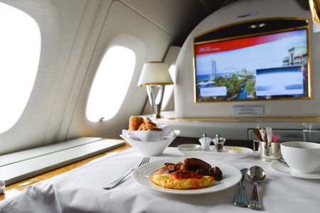 DUBAI, UAE - MARCH 31, 2015: Emirates Airbus A380 interior. Emirates is one of two flag carriers of...