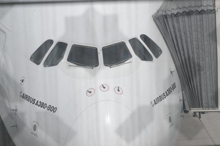 DUBAI, UAE - MARCH 10, 2015: Airbus A380 docked in Dubai airport. Dubai International Airport is an...