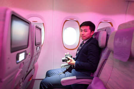 HONG KONG - MARCH 09, 2015: Emirates Airbus A380 economy class passenger. Emirates handles major part of passenger traffic and aircraft movements at the airport.のeditorial素材