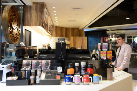 HONG KONG, CHINA - MAY 05, 2015: Pacific Coffee cafe interior. Pacific Coffee Company is a Pacific Northwest U.S.- style coffee shop group originating from Hong Kong, with a few outlets in China, Singapore and Malaysiaのeditorial素材