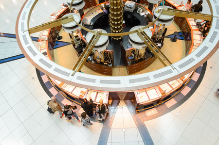 DUBAI - MARCH 10, 2015: The Dubai duty-free shopping area interior. Dubai International Airport is...