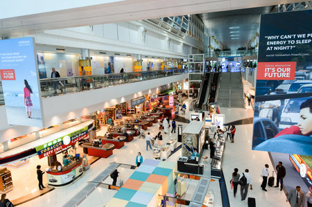 DUBAI - MARCH 10, 2015: The Dubai duty-free shopping area interior. Dubai International Airport is the primary airport serving Dubai and is the world's busiest airport by international passenger trafficのeditorial素材