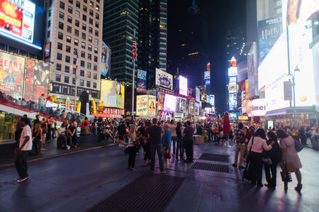 NEW YORK - SEPTEMBER 25, 2011: area around Times Square at night. Times Square is a major commercial...
