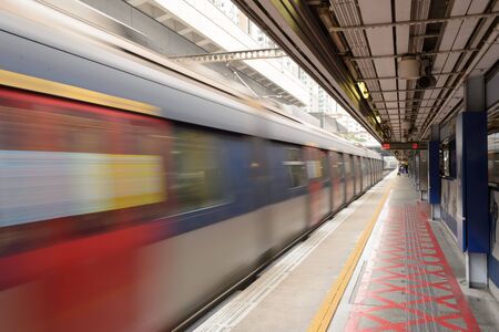 HONG KONG - APRIL 03, 2015: The Mass Transit Railway station. MTR is the rapid transit railway system in Hong Kong. It is one of the most profitable systems in the worldのeditorial素材