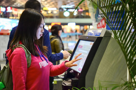 SHENZHEN, CHINA - FEBRUARY 16, 2015: airport interior. Shenzhen Bao'an International Airport is located near Huangtian and Fuyong villages in Bao'an District, Shenzhen, Guangdongのeditorial素材
