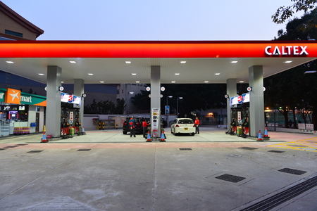 HONG KONG - FEBRUARY 04, 2015: Caltex fuel station at evening. Caltex is a petroleum brand name of...