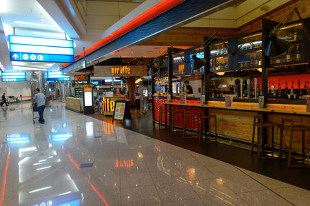 DUBAI, UAE - MARCH 10, 2015: DXB airport interior. Dubai International Airport is the primary airport serving Dubai, United Arab Emirates, and is the world's busiest airport by international passenger traffic.のeditorial素材