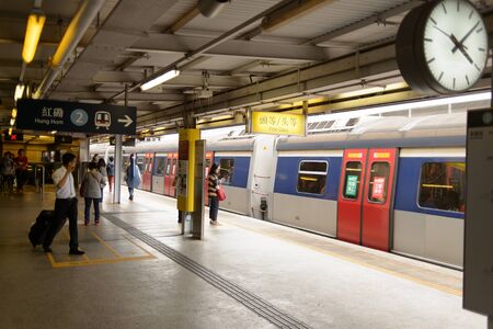 HONG KONG - APRIL 03, 2015: The Mass Transit Railway station. MTR is the rapid transit railway system in Hong Kong. It is one of the most profitable systems in the worldのeditorial素材