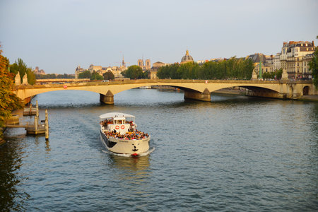 PARIS - SEP 07: Seine river in the evening on September 07, 2014 in Paris, France. Paris, aka City of Love, is a popular travel destination and a major city in Europeのeditorial素材