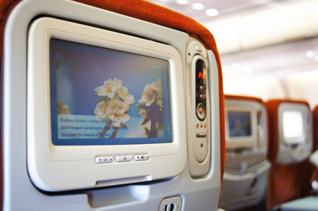 MOSCOW, RUSSIA - MARCH 31, 2011: Aeroflot A330 aircraft interior. Aeroflot is the flag carrier and largest airline of the Russian Federation. The carrier operates domestic and international passenger services, mainly from its hub at Sheremetyevo Internatiのeditorial素材