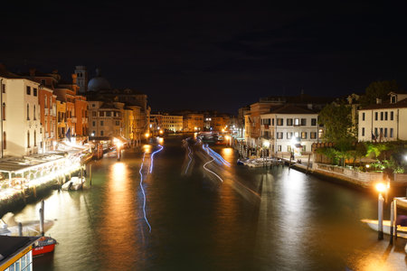 VENICE - SEP 14: Venice canal on September 14, 2014 in Venice, Italy. Venice is a city in northeastern Italy sited on a group of 118 small islands separated by canals and linked by bridgesのeditorial素材