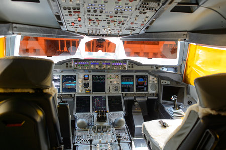 DUBAI, UAE - JUNE 22, 2015: Emirates A380-800 cockpit interior. Emirates is one of two flag carriers...