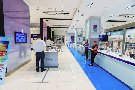 DUBAI - OCTOBER 15: gadgets and electronics devices shop in the Dubai Mall on October 15, 2014 in Dubai, UAE. The Dubai Mall located in Dubai, it is part of the 20-billion-dollar Downtown Dubai complex, and includes 1,200 shops.のeditorial素材