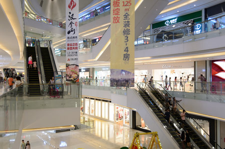 SHENZHEN, CHINA - MAY 17, 2015: shopping center interior. Shenzhen is a major city in the south of Southern China's Guangdong Province, situated immediately north of Hong Kong Special Administrative Region.のeditorial素材