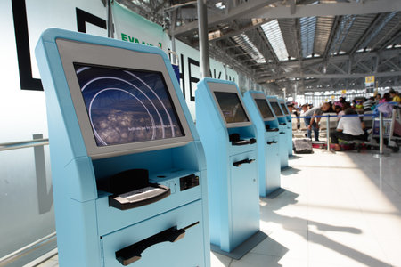 BANGKOK, THAILAND - JUNE 19, 2015: self check-in kiosks in Suvarnabhumi Airport. Suvarnabhumi Airport is one of two international airports serving Bangkokのeditorial素材