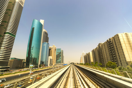DUBAI - OCT 15: view frorm the Dubai metro car on October 15, 2014. The Dubai Metro is a driverless, fully automated metro rail network in the United Arab Emirates city of Dubaiのeditorial素材