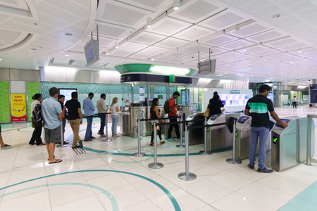 DUBAI - OCT 16: Dubai subway interior on October 16, 2014. The Dubai Metro is a driverless, fully automated metro rail network in the United Arab Emirates city of Dubaiのeditorial素材