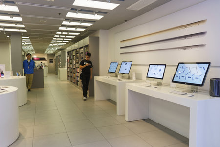 HONG KONG - APRIL 16, 2015: electronics shop with Apple gadgets. Apple Inc. is an American...