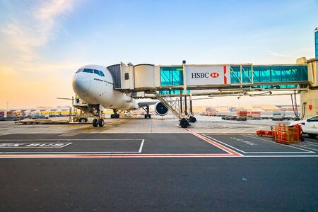 DUBAI, UAE - MARCH 30, 2015: Boeing 777-300ER at Dubai International Airport. The Boeing 777 is a family of long-range wide-body twin-engine jet airliners developed and manufactured by Boeing Commercial Airplanesのeditorial素材