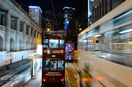 HONG KONG - JUNE 03, 2015: double-decker tram on street of HK. Hong Kong Tramways is a tram system in Hong Kong, being one of the earliest forms of public transport in the metropolis. Owned and operated by Veolia Transportのeditorial素材