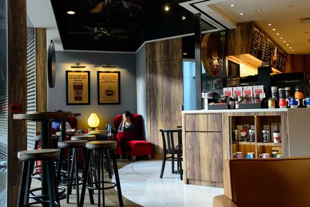 HONG KONG - JUNE 03, 2015: Pacific Coffee cafe interior. Pacific Coffee Company is a Pacific Northwest U.S.- style coffee shop group originating from Hong Kong, with a few outlets in China, Singapore and Malaysiaのeditorial素材