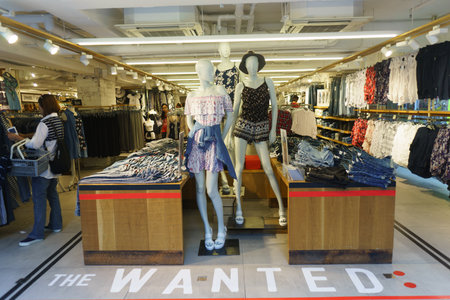 HONG KONG - APRIL 16, 2015: Hong Kong shopping mall interior. Hong Kong shopping malls are some of...