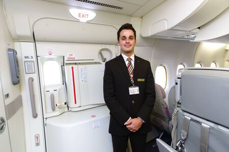 DUBAI - OCT 17: Emirates crew member in Airbus A380 aircraft on October 17, 2014 in Dubai, UAE....