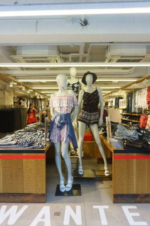 HONG KONG - APRIL 16, 2015: Hong Kong shopping mall interior. Hong Kong shopping malls are some of...