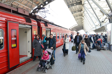 MOSCOW - MARCH 30:  Aeroexpress red train on Domodedovo Airport on March 30, 2014 in Moscow. Aeroexpress Ltd. is the operator of air rail link services in Moscow, Russiaのeditorial素材