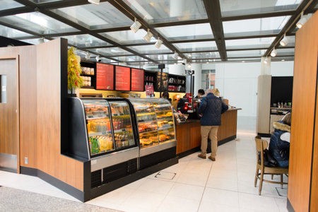 HONG KONG - DECEMBER 11: Starbucks cafe interior 11, 2014 in Hong Kong, China. Starbucks is the largest coffeehouse company in the world, with more then 23000 storesのeditorial素材
