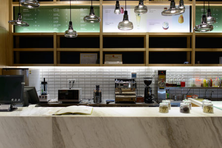 SHENZHEN, CHINA-APRIL 13: cafe interior on April 13, 2014 in Shenzhen, China. ShenZhen is regarded as one of the most successful Special Economic Zones.のeditorial素材