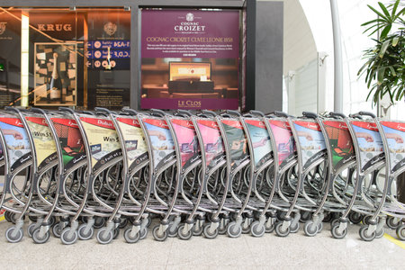 DUBAI, UAE - MARCH 31: trollies in airport on March 31, 2014 in Dubai. Dubai International Airport is a major airline hub in the Middle East, and is the main airport of Dubai.のeditorial素材
