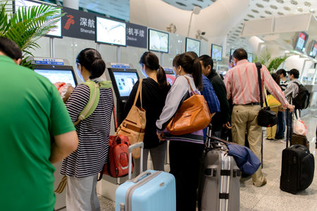 SHENZHEN - APRIL 16: airport interior on April 16, 2014 in Shenzhen, China. Shenzhen Bao'an International Airport is located near Huangtian and Fuyong villages in Bao'an District, Shenzhen, Guangdongのeditorial素材